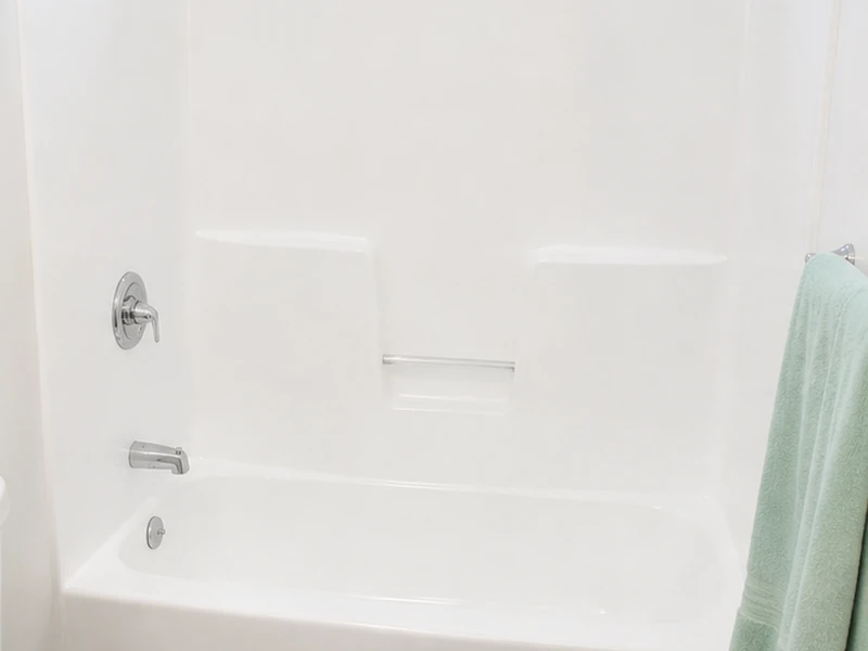Refinished glossy white fiberglass tub and shower combo in a Ponderosa apartment, Sunnyvale
