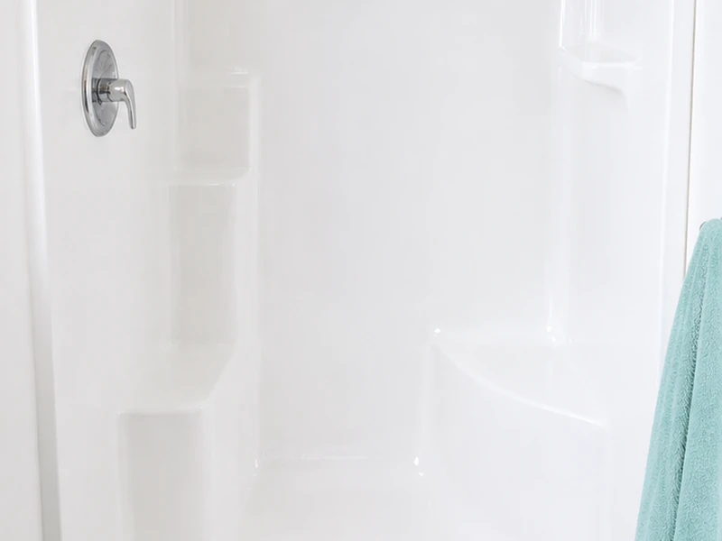 Freshly refinished glossy white fiberglass shower stall in a Sunnyvale bathroom